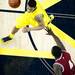 Michigan sophomore Trey Burke dribbles the ball near center court in the game against Indiana on Sunday, March 10. Daniel Brenner I AnnArbor.com
